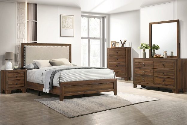 Warm brown bedroom set with upholstered headboard, dresser, and chest