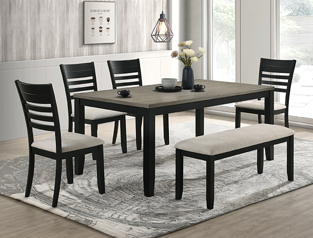 Modern farmhouse dining set — black frame with weathered gray top, four ladder-back chairs, and a bench — in stock at BoxDrop of Angola